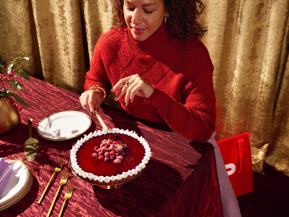 a festive tabletop scene with a dessert and dining items