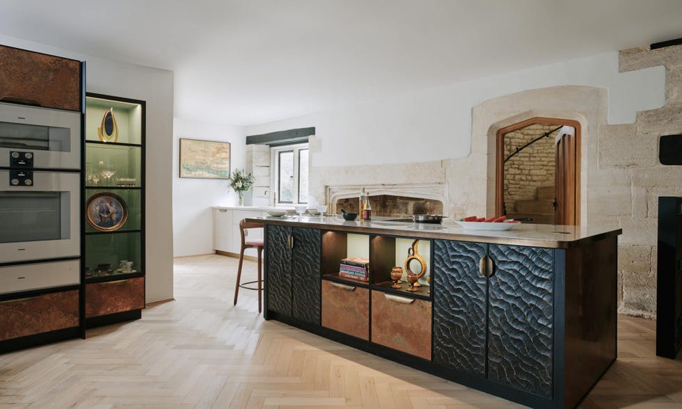 a kitchen with a marble counter top