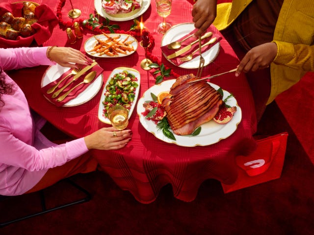 dinner table set with a variety of festive food items