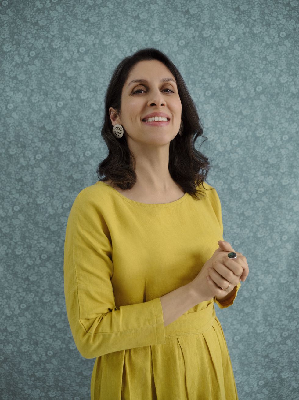 zaghari ratcliffe wearing the same mustard yellow dress, which she made in prison﻿