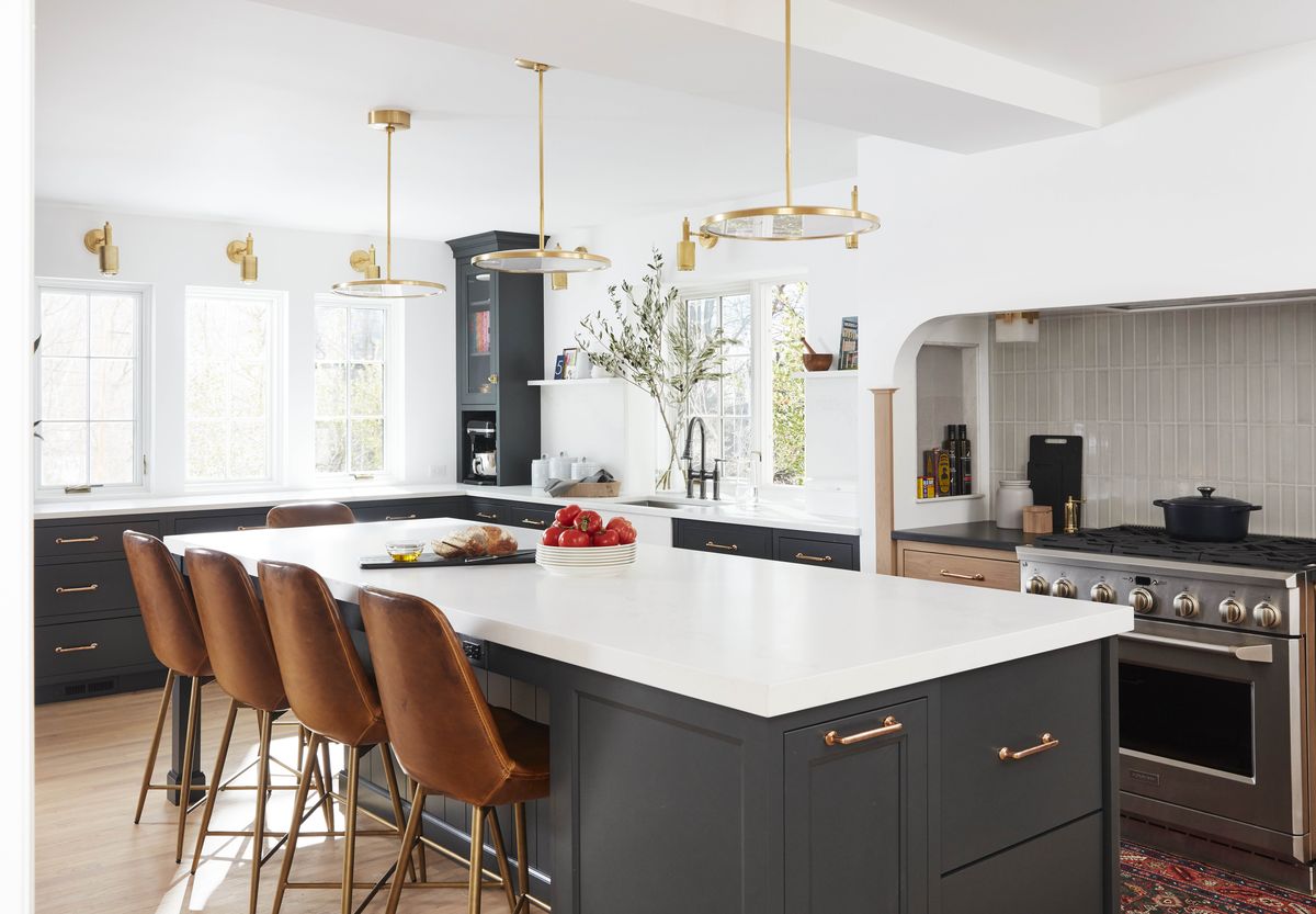 kitchen with gray cabinets and gold fixtures
