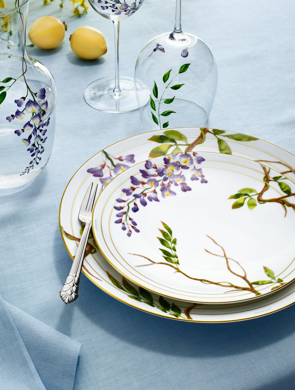 a floral glass and tableware