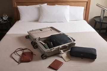 a suitcase on a bed