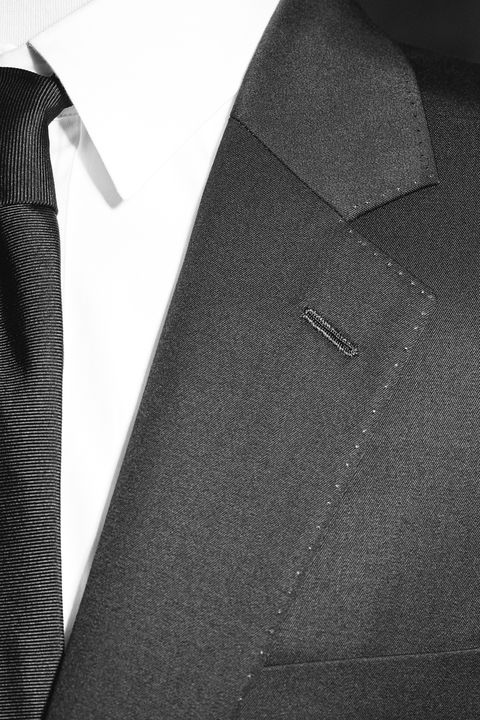 Black, Suit, Outerwear, Blazer, Jeans, Pattern, Formal wear, Tie, Trousers, Pocket, 