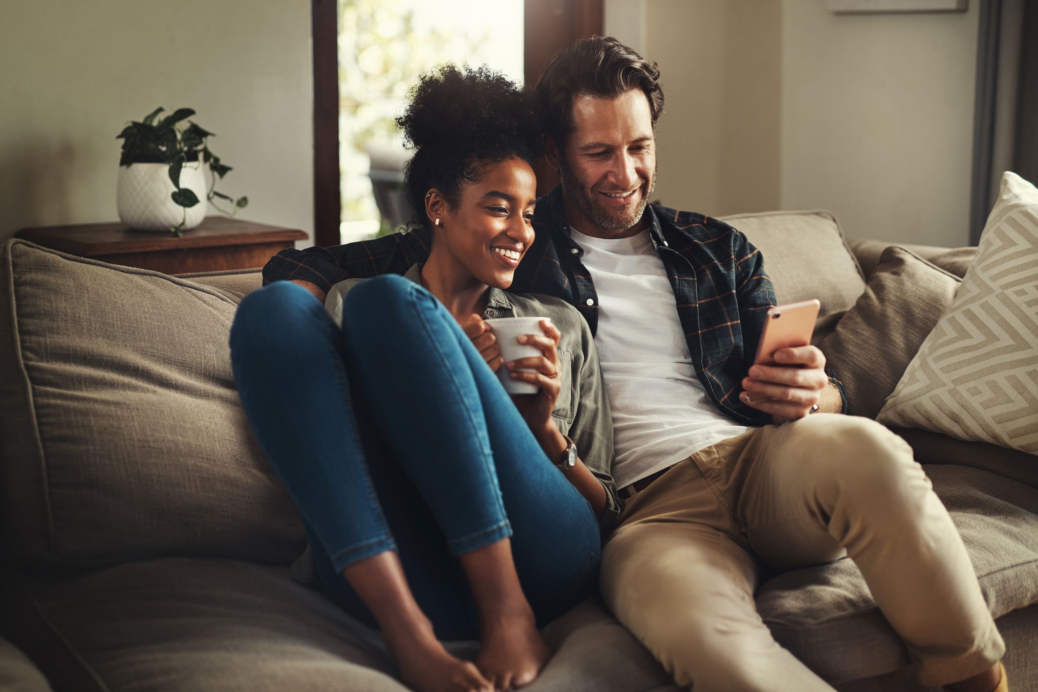 shot of a happy young couple using a digital tablet royalty free image