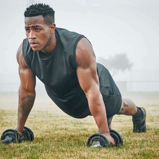 https://hips.hearstapps.com/hmg-prod/images/shot-of-a-muscular-young-man-exercising-with-royalty-free-image-1657806797.jpg?crop=0.699xw:1.00xh;0.117xw,0&resize=640:*