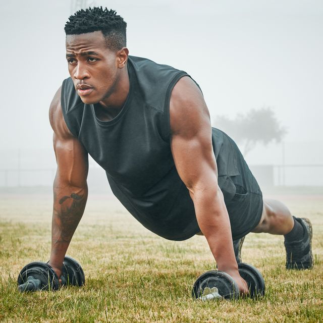 https://hips.hearstapps.com/hmg-prod/images/shot-of-a-muscular-young-man-exercising-with-royalty-free-image-1657806797.jpg?crop=0.699xw:1.00xh;0.117xw,0&resize=640:*