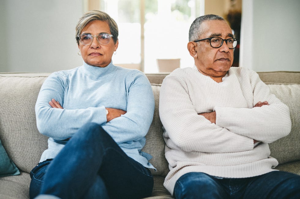 shot of a senior couple arguing at home