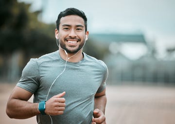 shot of a young man going for a morning run