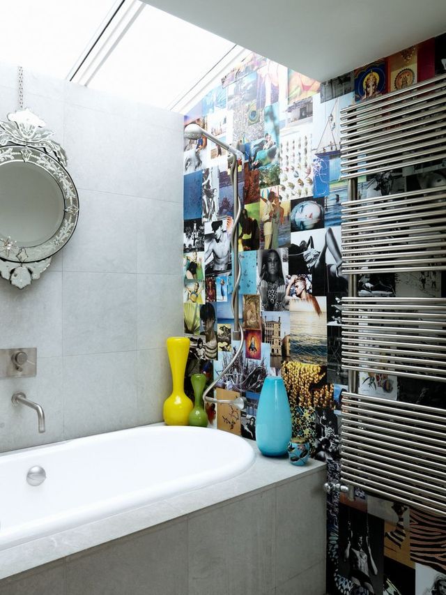 Matthew Williamson's bathroom featuring collage wall behind showerhead over bath