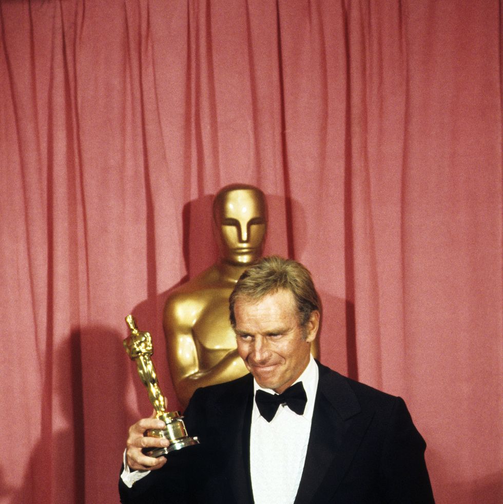 celebrity oscar hosts charlton heston