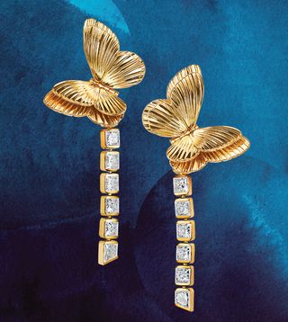 gold and diamond drop earrings with butterfly post