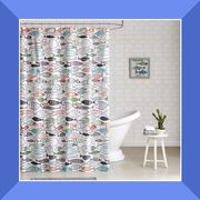 a colorful fish colored shower curtain and a shower curtain with a navy blue and white design