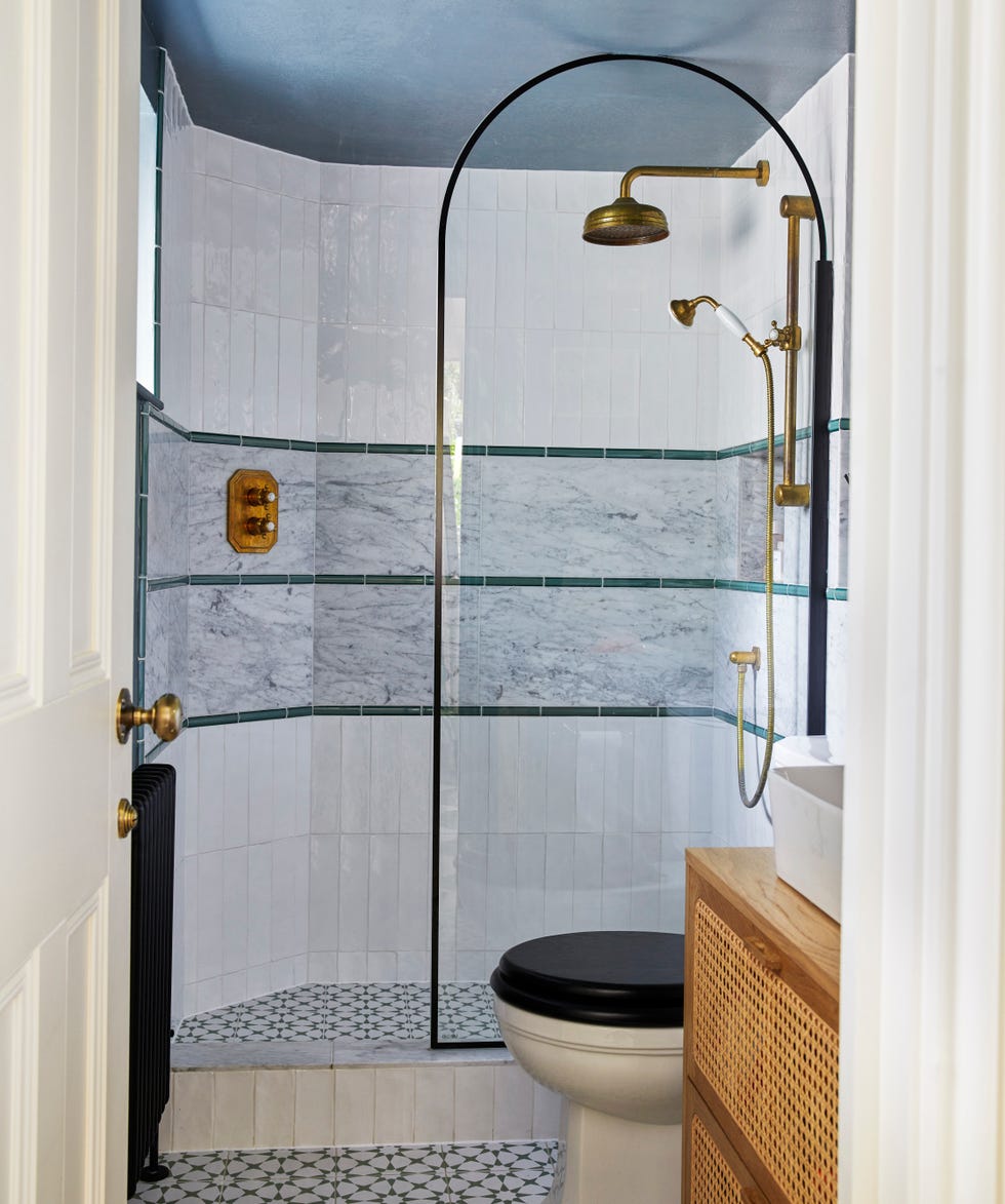 walk in shower with rounded glass screen