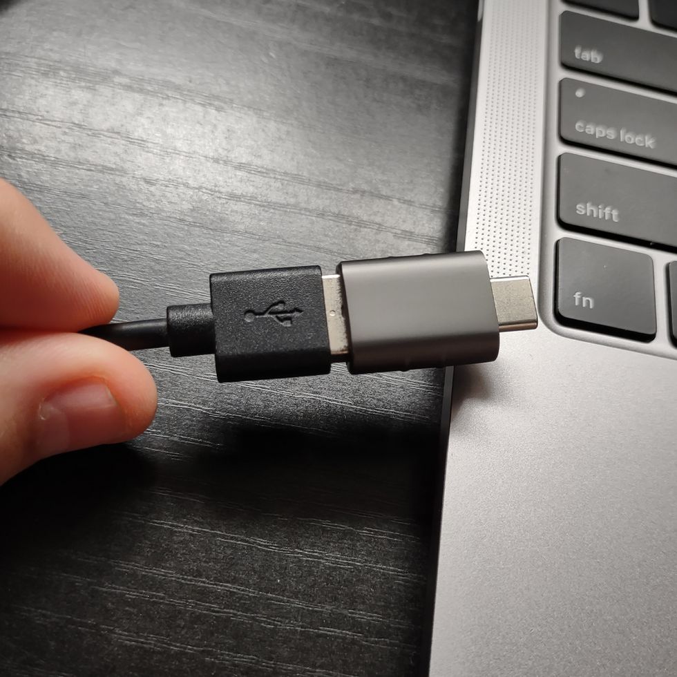 showing the adapter attached to a usb a