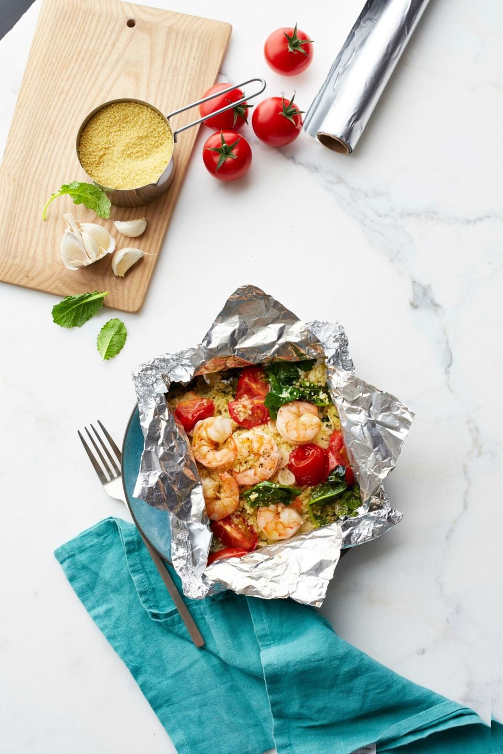 shrimp and garlicky tomatoes with kale couscous