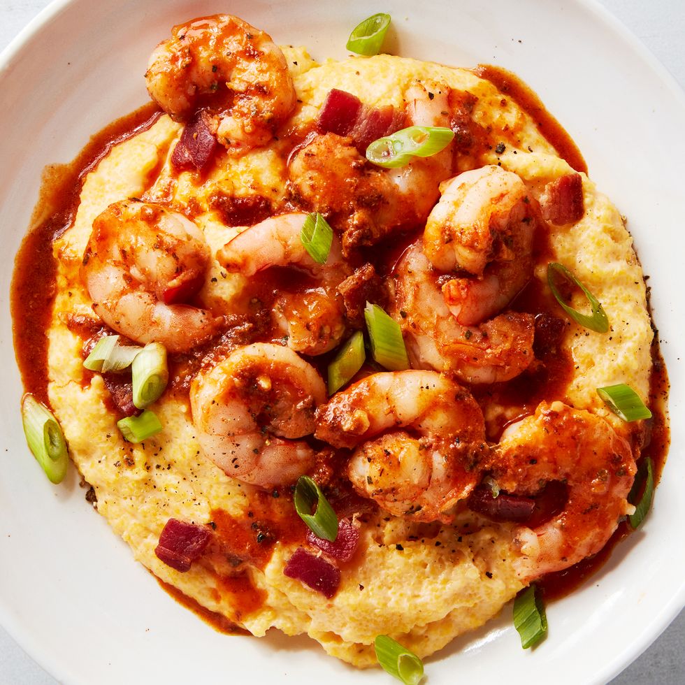 shrimp and grits in a bowl with greens onion