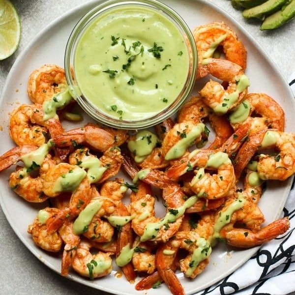 https://hips.hearstapps.com/hmg-prod/images/shrimp-appetizers-chili-lime-shrimp-avocado-crema-6580a6823dc54.jpeg?crop=1.00xw:0.667xh;0,0.187xh&resize=980:*