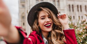 Hair, Lip, Red, Facial expression, Beauty, Pink, Street fashion, Smile, Fashion, Finger, 