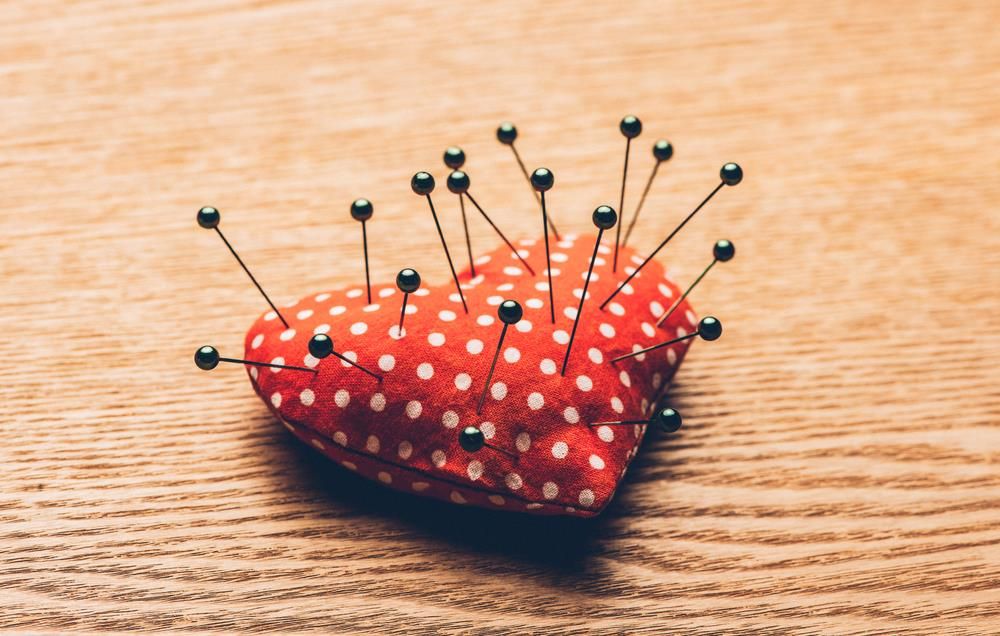Pins in heart pincushion