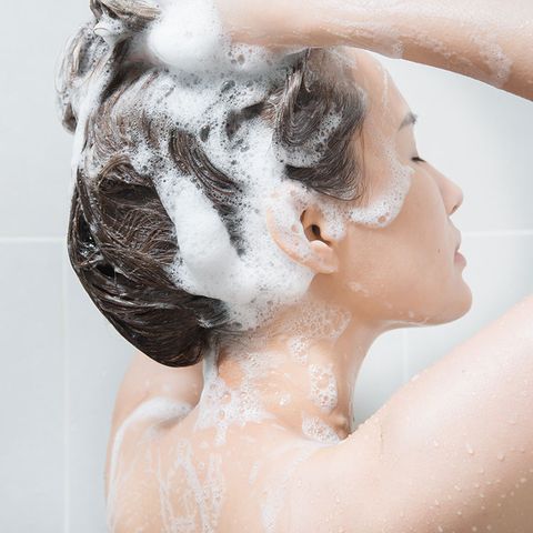 Piling hair on head to shampoo