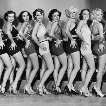 Line of women showing off their legs