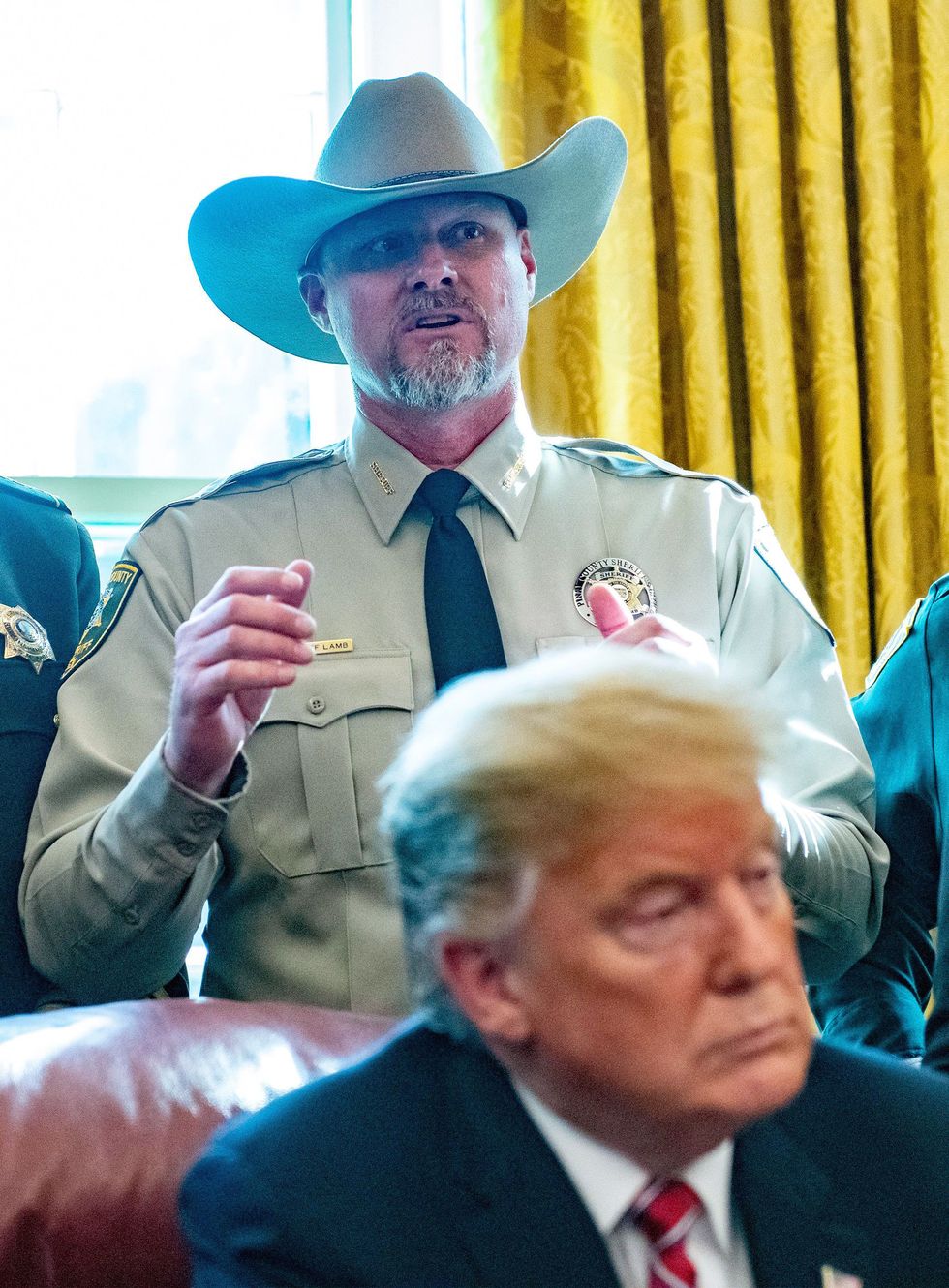 mandatory credit photo by shutterstock 10157340m
sheriff mark lamb of pinal county, arizona, makes a statement prior to united states president donald trump signing the veto statement of the bill passed by congress to to block the national emergency he declared earlier to fund the long delayed southern border wall in the oval office of the white house in washington, dc
donald trump signs veto statement, washington dc, usa   15 mar 2019