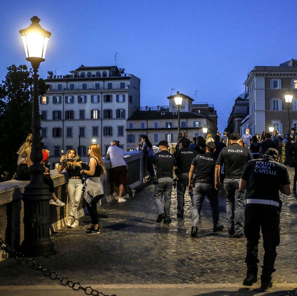 mandatory credit photo by fabio frustaciepa efeshutterstock 10656464xpolice patrol as people enjoy an evening out in trastevere district, rome, italy, 23 may 2020 several countries around the world are easing covid 19 lockdown restrictions in an effort to restart their economies and help people in their daily routines after the outbreak of coronavirus pandemiccoronavirus in italy phase 2, rome   23 may 2020