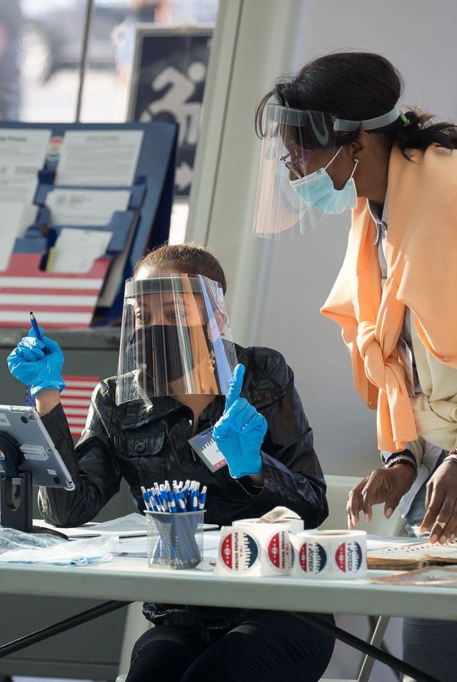 mandatory credit photo by chine nouvellesipashutterstock 10690243f
poll workers wearing personal protective equipment work at a polling site in brooklyn borough of new york, the united states, june 23, 2020 new york held 2020 primary elections on tuesday
us new york primary elections   23 jun 2020