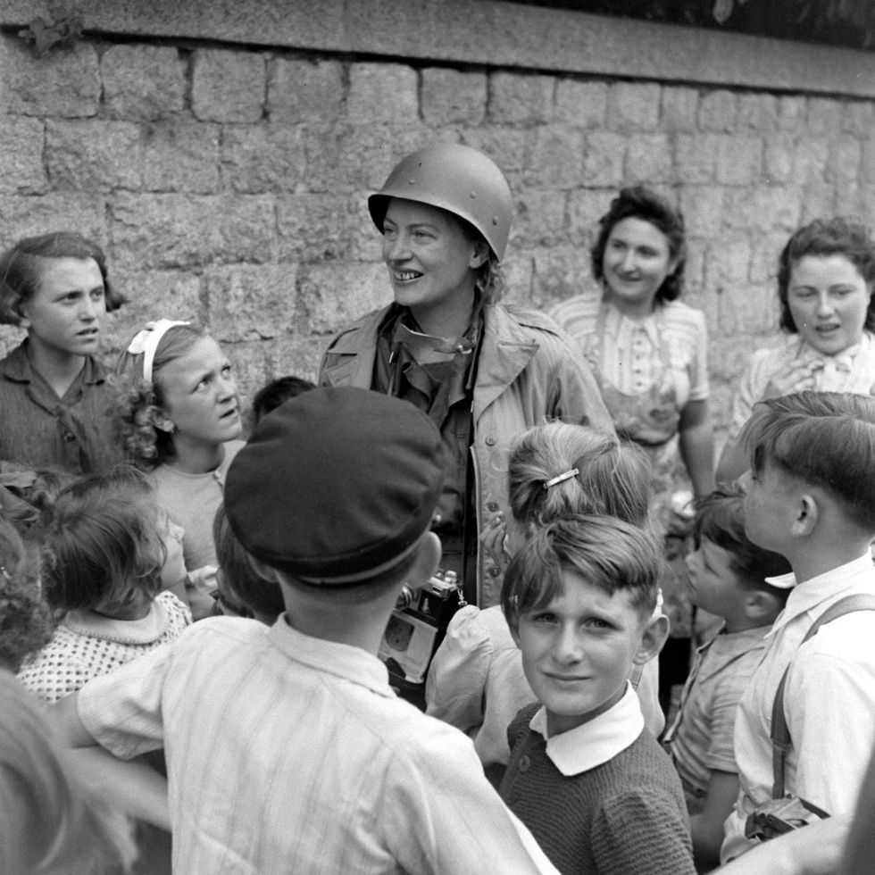 world war ii, france photographer lee miller with children during world war ii, france, august 1944