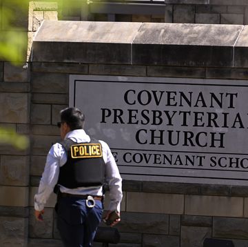 mandatory credit photo by john amisapshutterstock 13847481c police officer walks by an entrance to the covenant school after a shooting in nashville, tenn on school shooting, nashville, united states 27 mar 2023