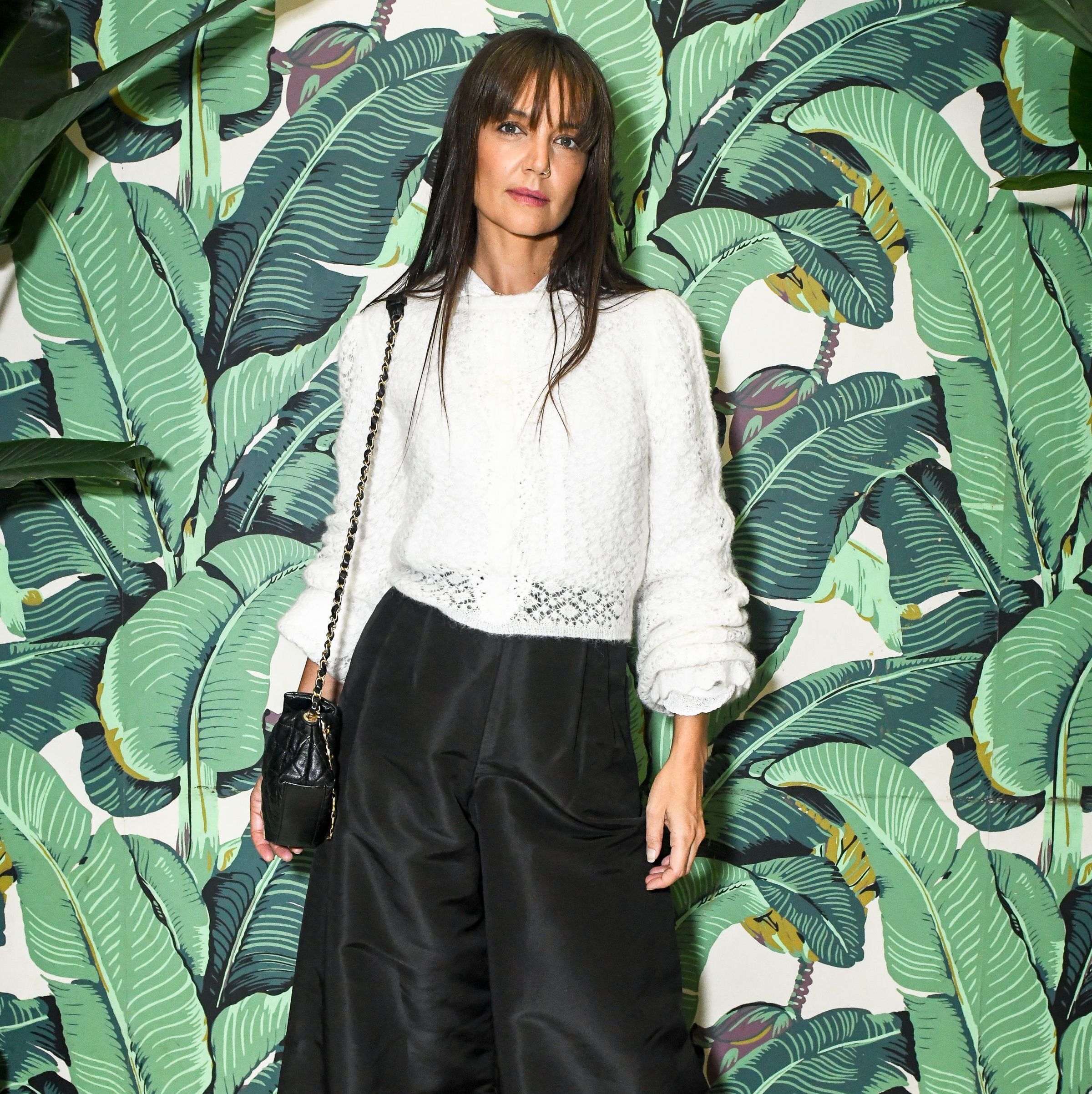 Katie Holmes Does Quiet Elegance in a Sheer Sweater, Big Pants, and Glossy Flats