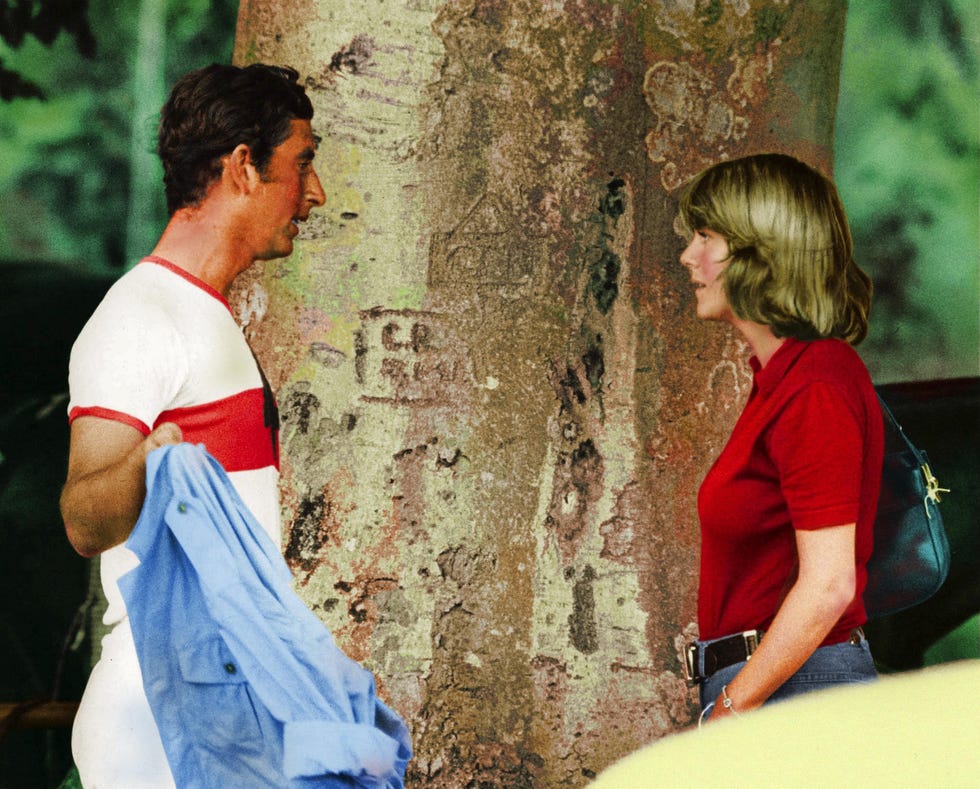 note this picture has been digitally colourised
mandatory credit photo by shutterstock 55359e
prince charles talking to camilla parker bowles at a polo match
prince charles talking to camilla parker bowles at a polo match, cirencester park, britain   july 1975