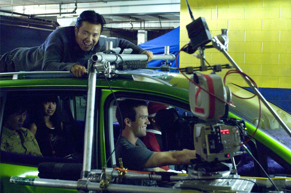 editorial use only no book cover usage
mandatory credit photo by sidney baldwinuniversalkobalshutterstock 5884521l
justin lin, lucas black
the fast and the furious   tokyo drift   2006
director justin lin
universal
usa
onoff set
actionadventure
