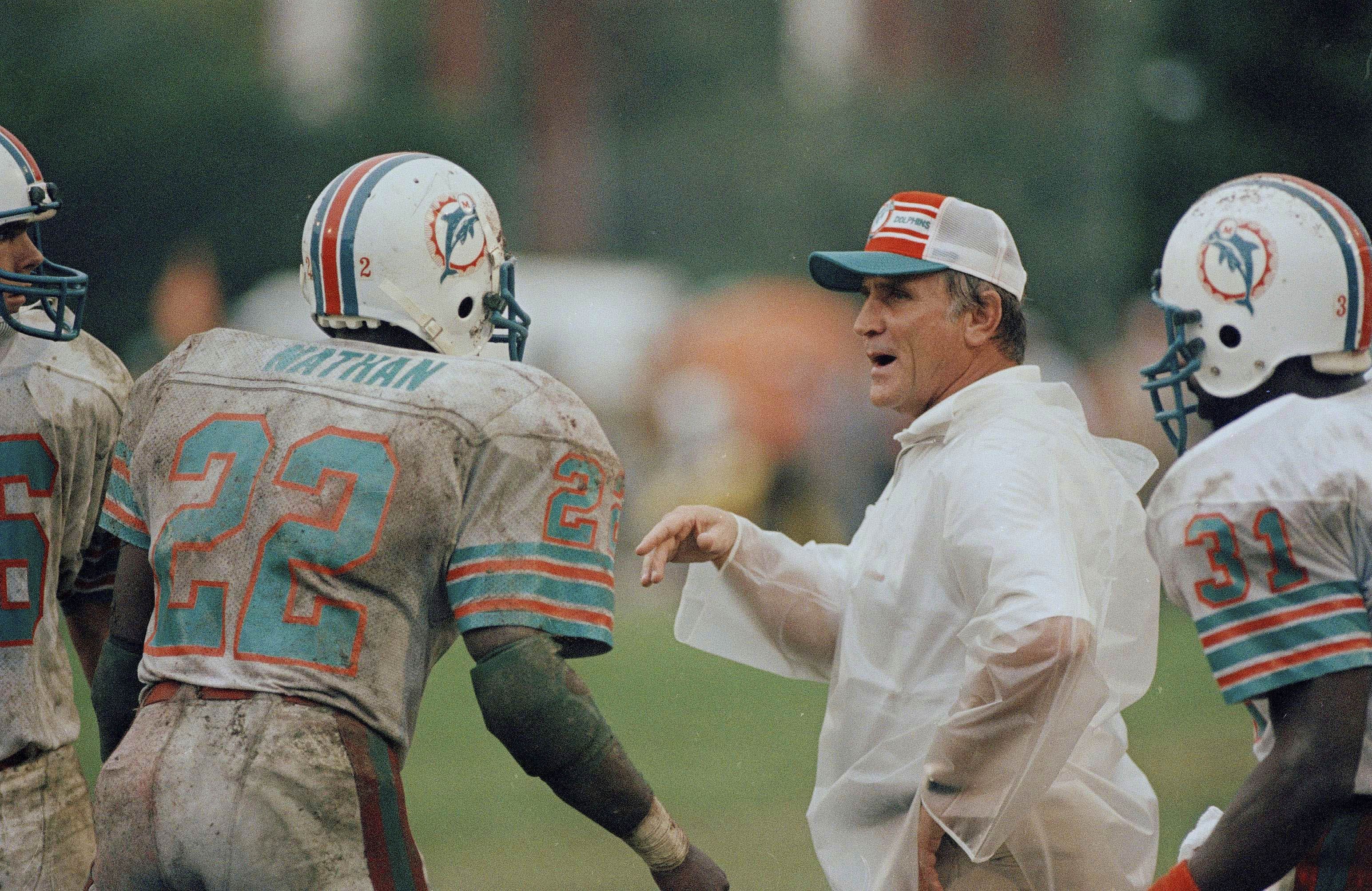 Miami Dolphins coach Don Shula discusses with quarterback Dan