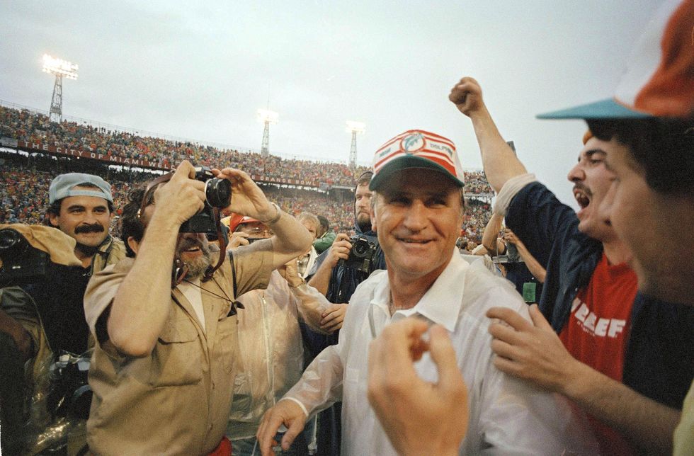 mandatory credit photo by uncreditedapshutterstock 6547857adon shula don shula, miami dolphins coach celebrating the dolphins win over the new york jets, jan 1983don shula, usa