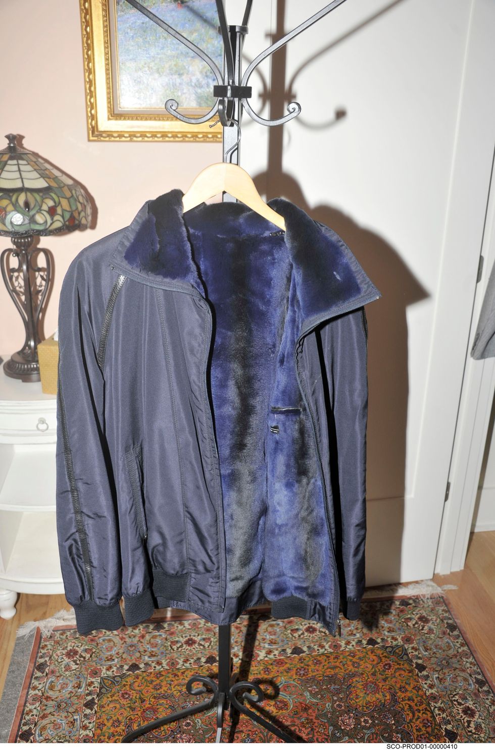Clothes hanger, Clothing, Outerwear, Jacket, Room, Leather jacket, Sleeve, Boutique, Coat, 