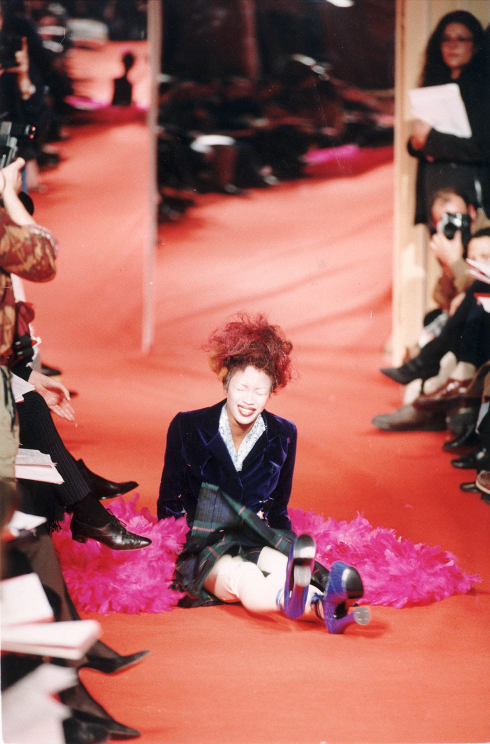 mandatory credit photo by neville marrinerdaily mailshutterstock 1147110anaomi campbell model losses her footing on a paris catwalk during vivienne westwood fashion show  march 17 1993 naomi campbell model losses her footing on a paris catwalk during vivienne westwood fashion show  march 17 1993