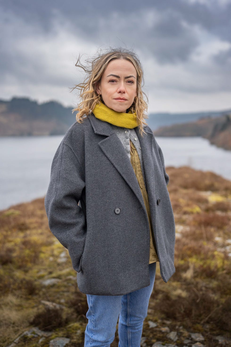 person standing outdoors near a body of water