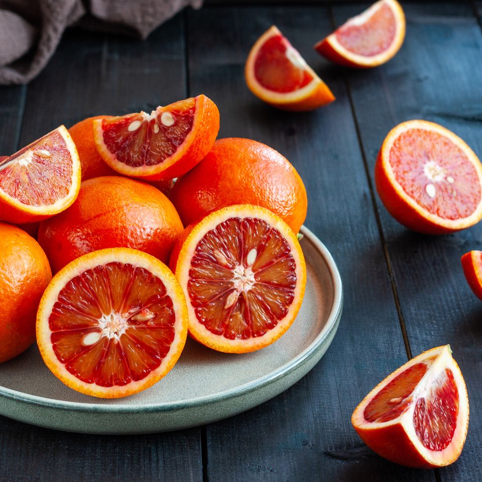 sicilian blood oranges on dark background