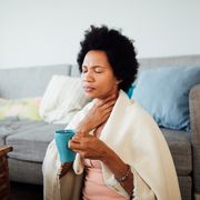 sick african american woman staying at home