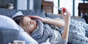 sick female with cold and flu health care concept