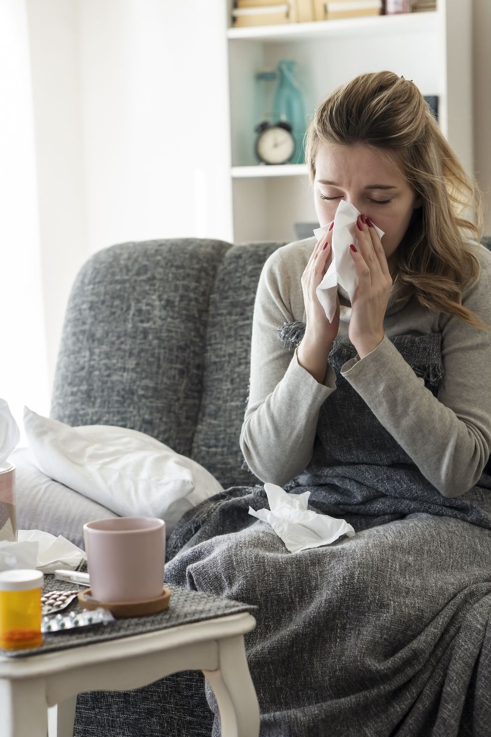 sick woman with flu at home