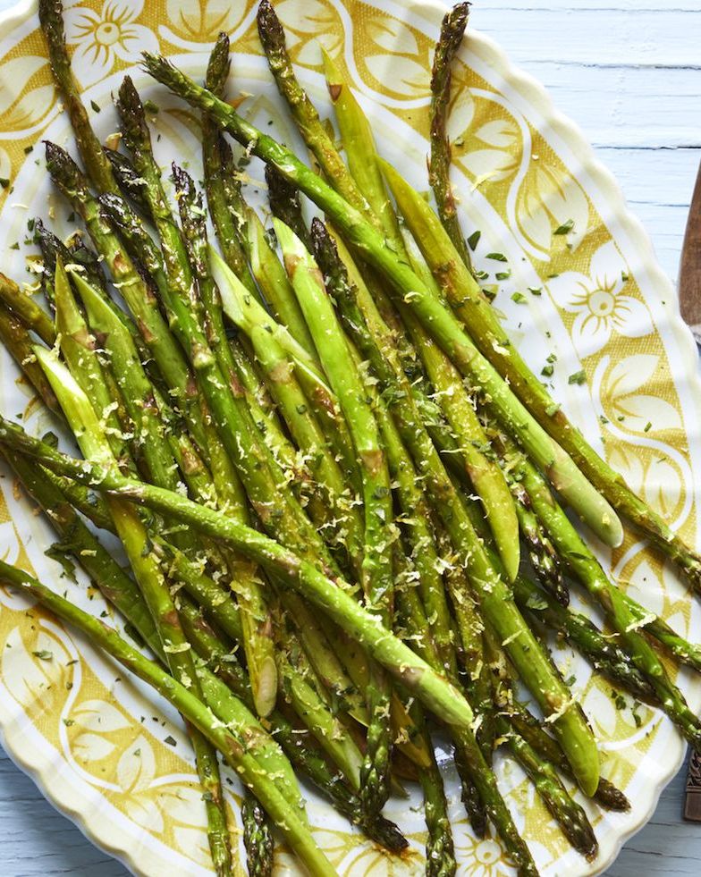 lemon roasted asparagus on yellow plate