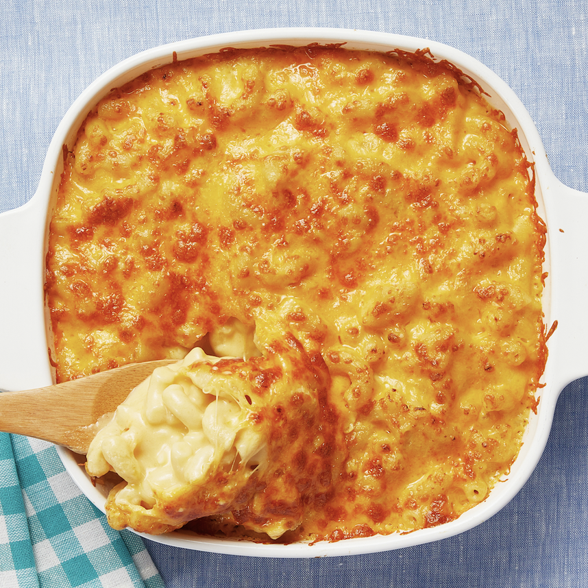 macaroni and cheese with wooden spoon