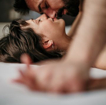 side view of a sensual couple having morning sex