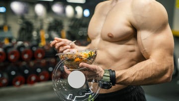 side view of men eating healthy food in gym mockup your brand