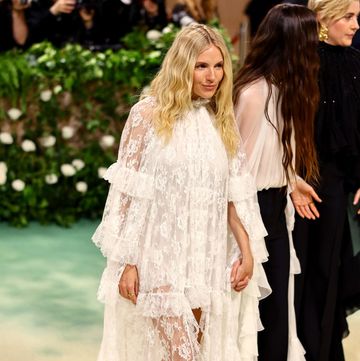 sienna miller attends the 2024 met gala in a white lace chloé dress
