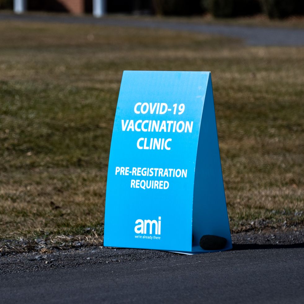 a sign seen for a covid19 vaccination clinic at the central