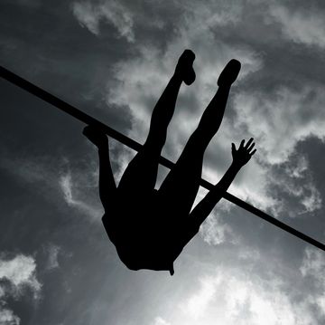 silhouette of high jumper